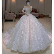 One-word shoulder main wedding dress 2020 new temperament bride big tail 2021 French light simple atmosphere starry sky