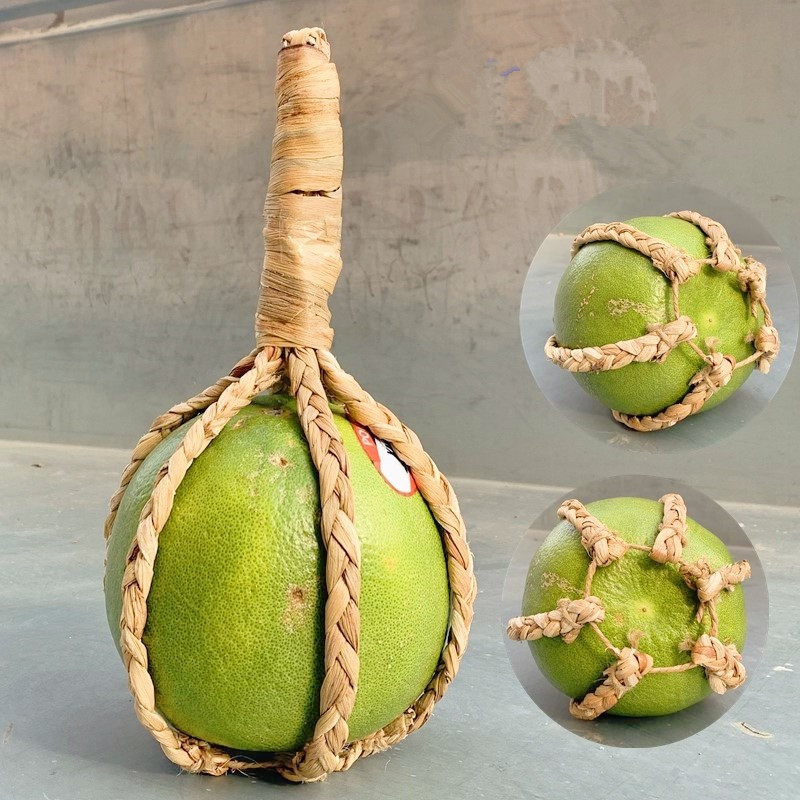 Water hyacinth straw woven grapefruit packaging bag straw woven mesh bag straw fruit packaging pocket fruit handle basket can be customized