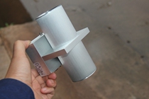 The LED wall lamp in the modern style of the outlet is illuminated up and down