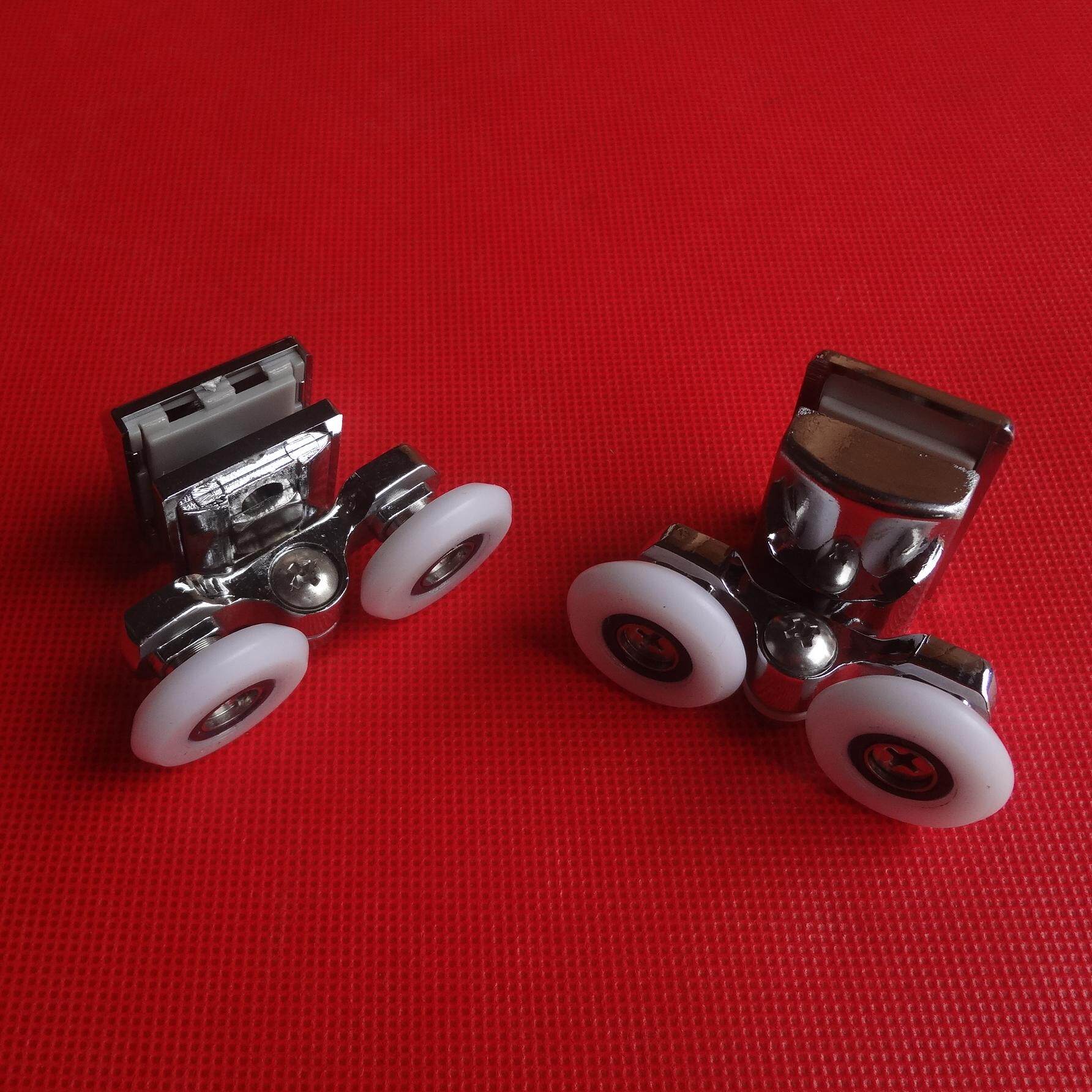 The old bathroom shower room with small glass holes double pulley accessories can adjust the flushing room roller wheels