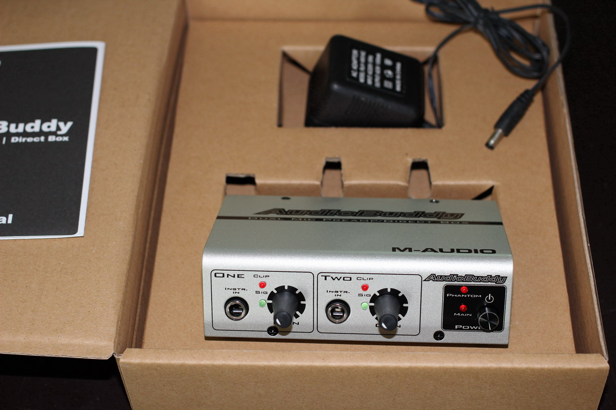 Audio Buddy dual-channel microphone release licensed with warranty card