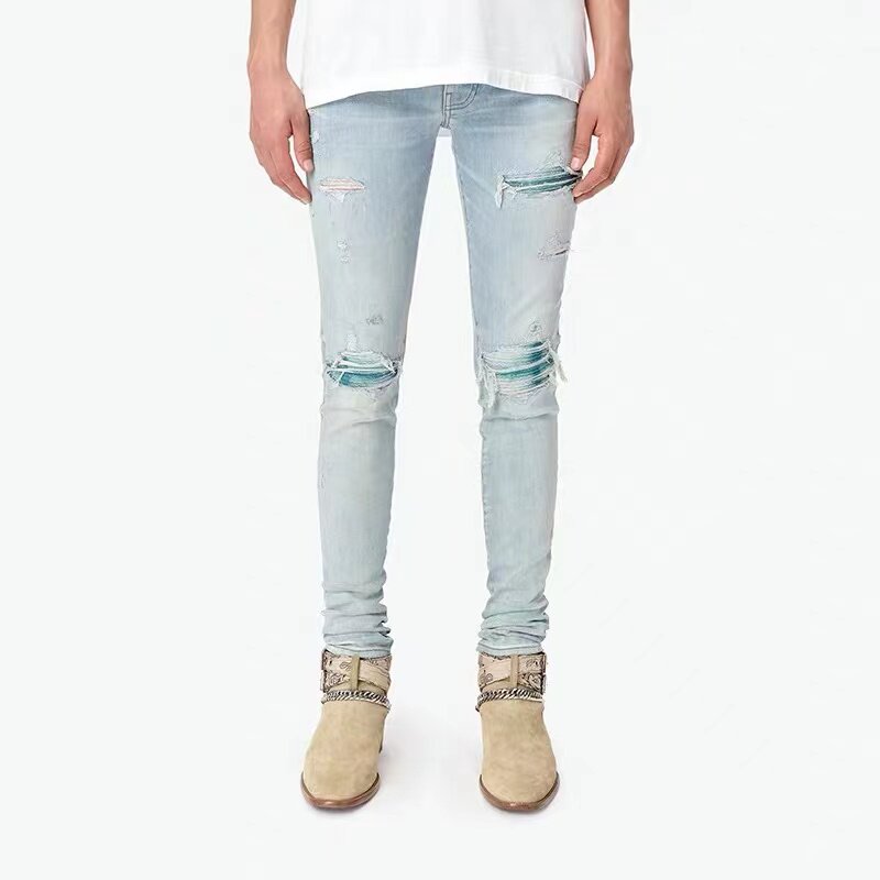AMIRI trendy brand ripped SS men's slim-fit European and American cashew flower high street popular splicing jeans