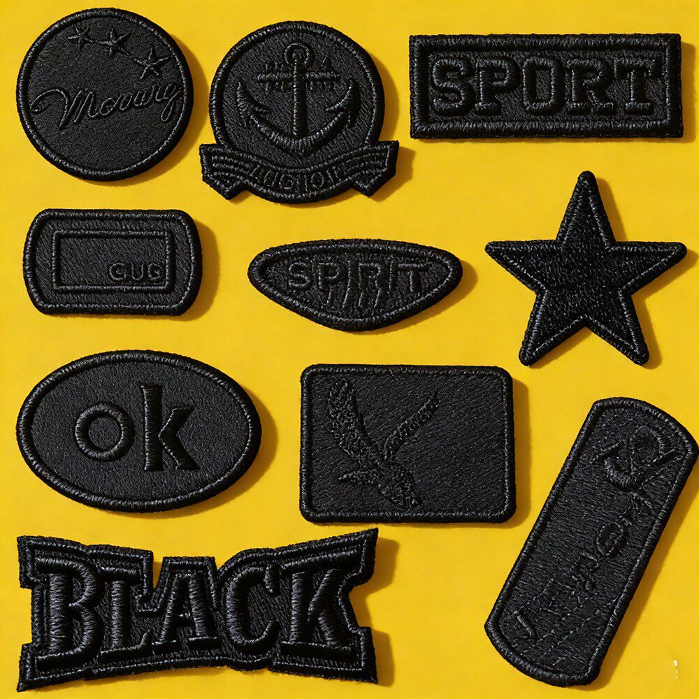 ダウンジャケットの継ぎ目のない補修に使える黒色の布製パッチ、衣類、レザージャケット、Tシャツ、パンツの穴を補修するための刺繍入り粘着パッチ。