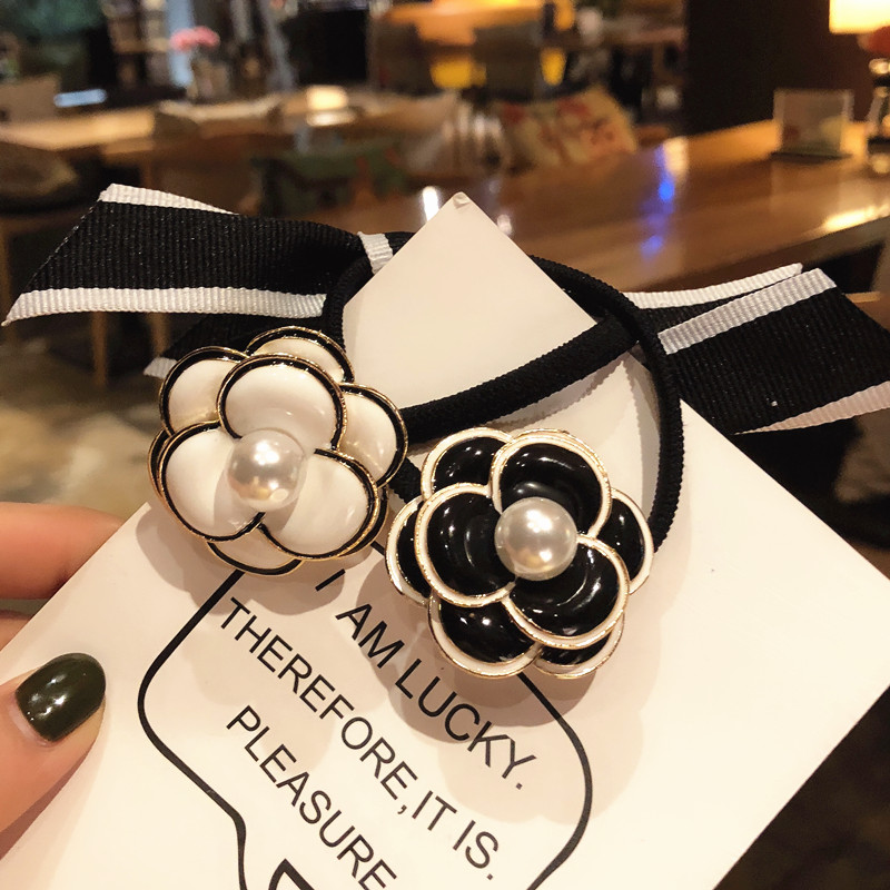 Korean fashion ins high-end big camellia metal hair ring small fragrant wind camellia rubber band high elastic hair rope