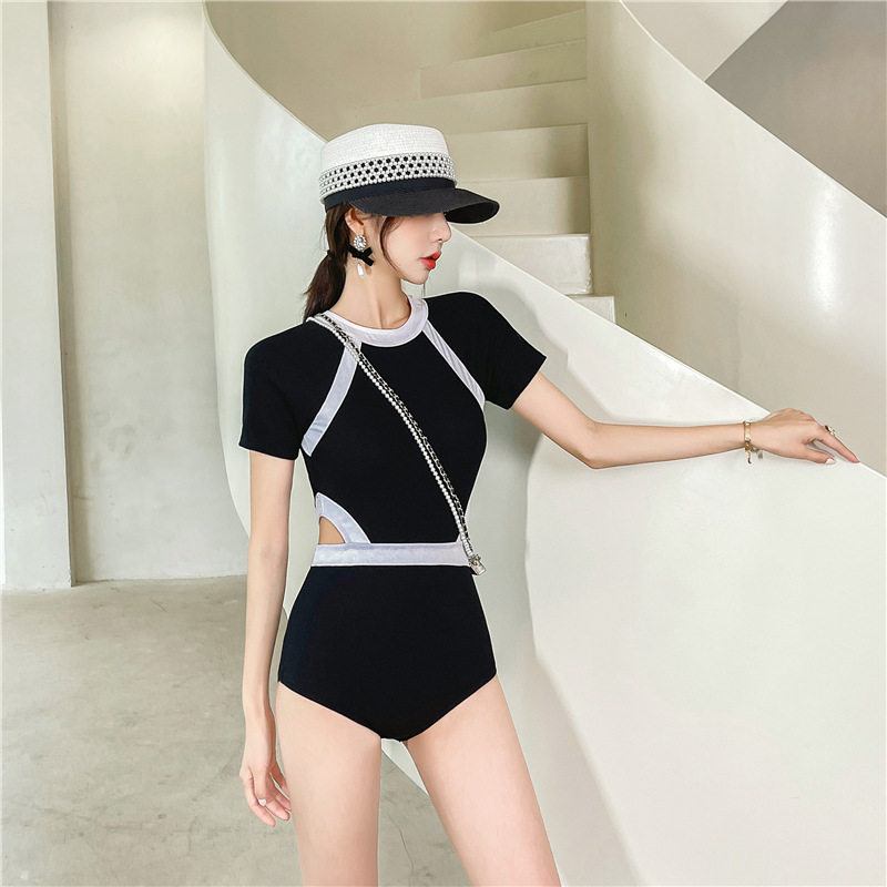 2021 new sexy backless matching color belt chest pad one-piece swimsuit conservative ins style half-sleeved small fragrance swimsuit women