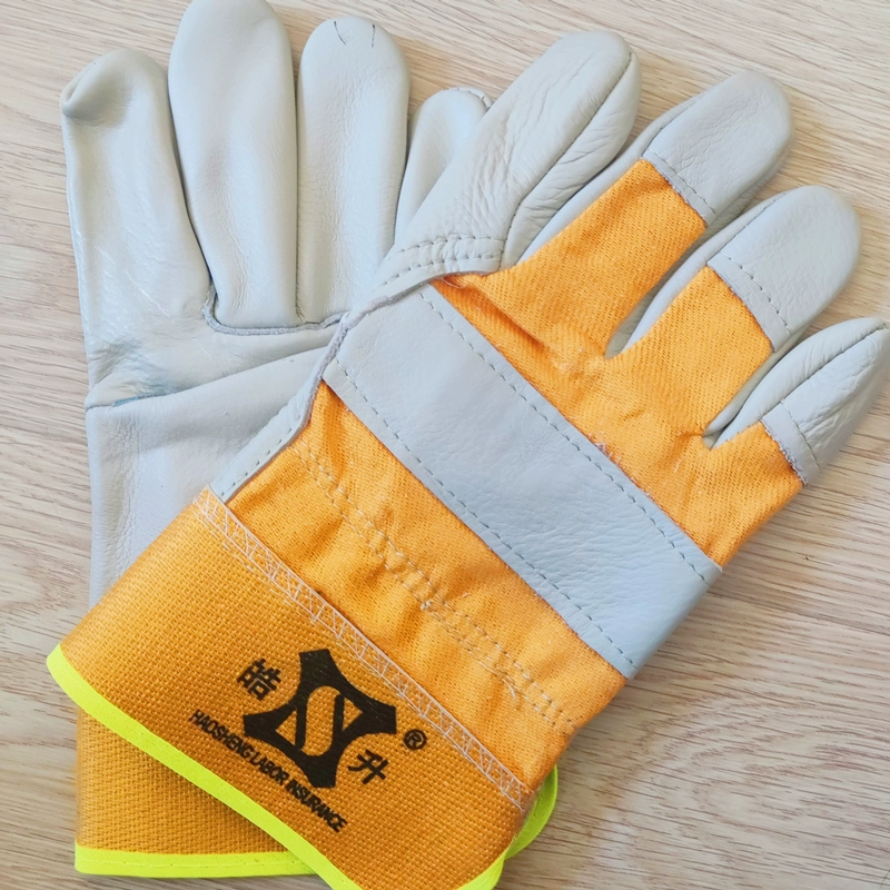 găng tay thợ hàn Vải màu vàng một lớp da bò găng tay hàn ngắn cho thợ hàn polyester cotton đầy đủ lớp da trên cùng Huachuang cách nhiệt chống cháy chịu nhiệt độ cao găng tay da dài bao tay hàn chịu nhiệt