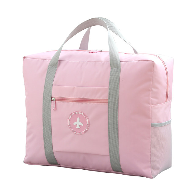 Travel bag on the suitcase waterproof storage bag folding handbag clothes finishing packing bag waiting for delivery bag