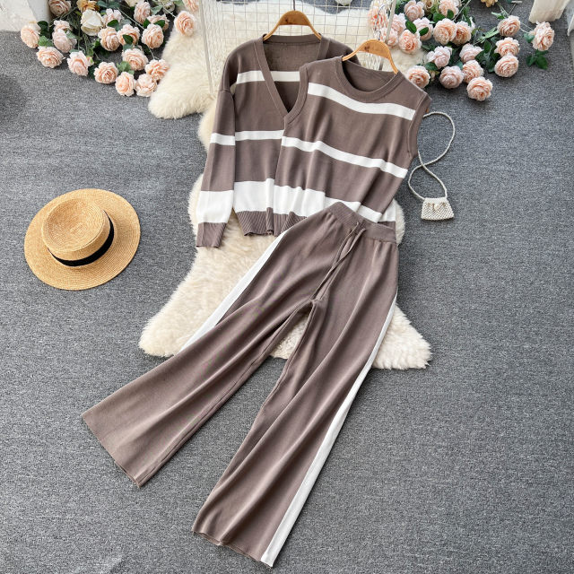 Autumn and winter striped color contrast knitted casual suit women's long-sleeved cardigan + sleeveless vest + wide-leg trousers two-piece set