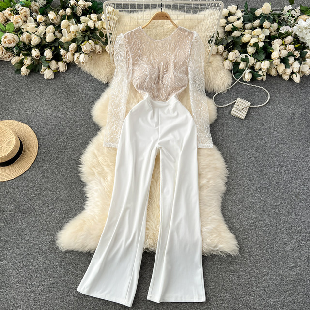 Light luxury and high-end jumpsuit women's ins European and American style round neck puff sleeves embroidered backless elegant trousers