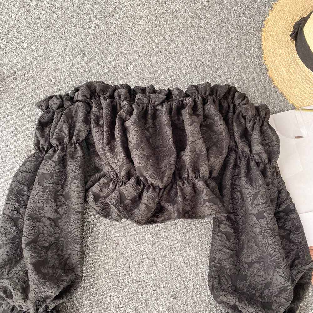 Black One-shoulder Tube Top Shirt on display