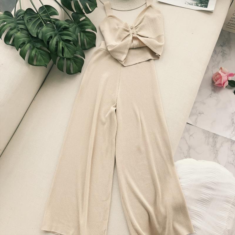 Hàn quốc phiên bản của thời trang đan phù hợp với một cách cẩn thận máy xếp li V-Cổ yếm trong top + đàn hồi cao eo chân rộng hai mảnh đồ công sở nữ