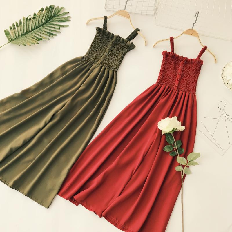 Váy dài bãi biển hè 2018 mới xếp li ống tai bằng gỗ trang trí nút cao eo thon cao chân rộng quai jumpsuit váy chiết eo cao	