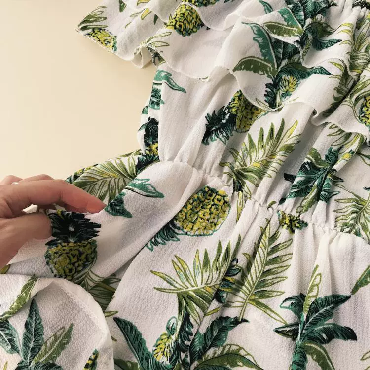 Học sinh nhỏ xù từ cổ áo lệch vai ngắn tay dứa in eo rộng chân cát khó jumpsuit quần short