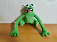 Зеленый длинное рук монстр