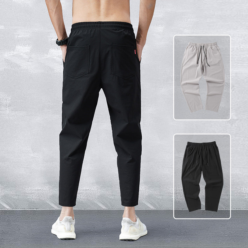 Men's casual pants small feet cropped pants loose trendy trousers slim spring and summer ice silk thin section harem pants large size