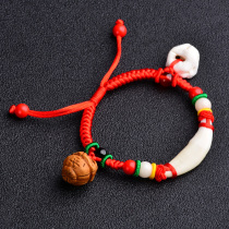 Baby baby braided hand rope to ward off evil spirits Pressure shock bracelet pig shock bone black dog teeth Peach wood childrens red rope bracelet men and women