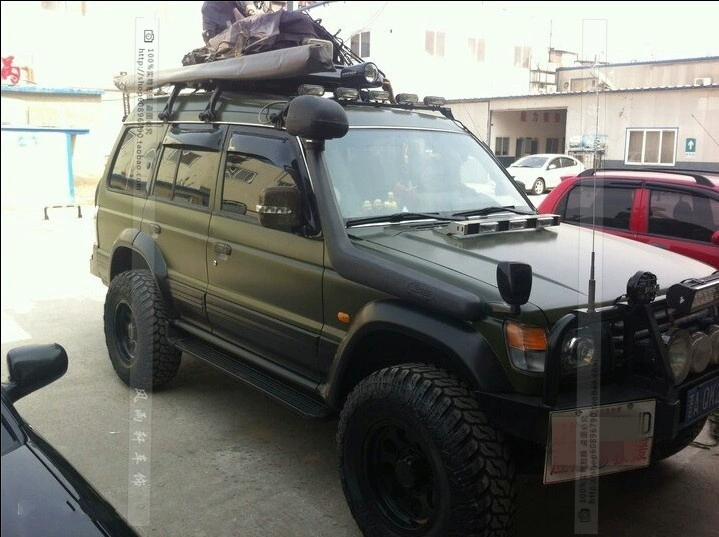 Chính hãng Pajero v31 v32 v33 Cheetah hộp hành lý Q6 Qibing Black King Kong giá đỡ hành lý giá nóc - Roof Rack