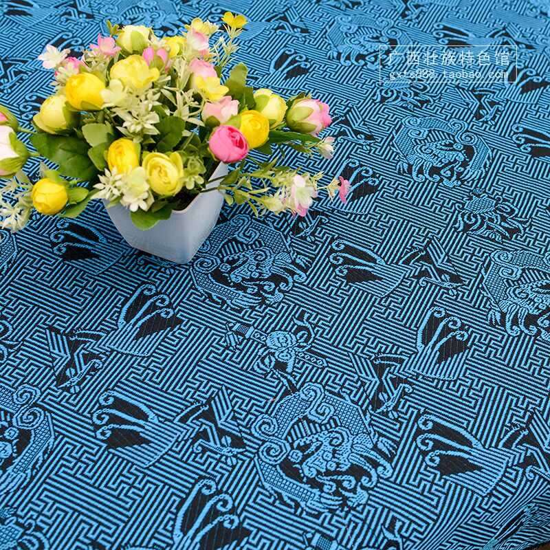 Guangxi Zhuang traditional totem Zhuang brocade pattern Dragon phoenix pattern Black and blue decorative fabric Fabric clothing pattern