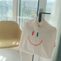 Korea INS kindergarten smiley face quilt storage bag home clothing finishing storage quilt storage tote bag