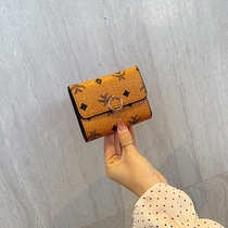 Small wallet female short 2021 New Korean student retro folding pocket pocket simple buckle card bag ins tide