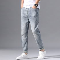Hong Kong Tide brand summer thin jeans mens slim feet Korean trend summer light color casual long pants