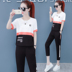 Loose-fitting ngắn tay thể thao bộ của phụ nữ mùa hè 2020 thời trang mới bảo vệ lớn mã ngẫu nhiên hai mảnh chạy phù hợp 