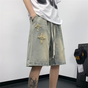 夏季薄款破洞牛仔短裤男宽松中裤潮牌街头百搭五分裤 NG35图片