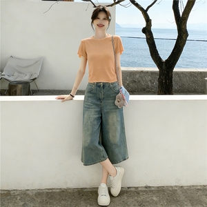 设计感小众时尚运动休闲套装女夏新款圆领背镂空短袖牛仔裤两件套图片