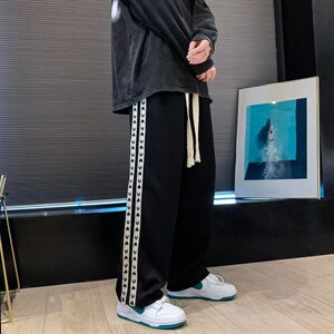 男春季潮流时尚休闲长裤E63P36图片