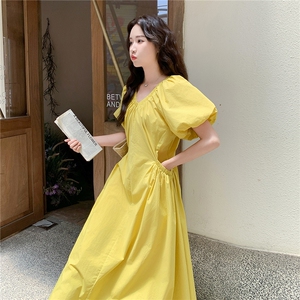 法式黄色度假风连衣裙女2025夏季新款高级感宽松V领泡泡袖长裙图片
