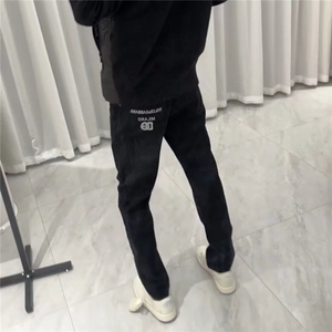 网红同款刺绣恶魔眼睛牛仔裤男潮牌黑色百搭修身小脚时尚休闲长裤图片
