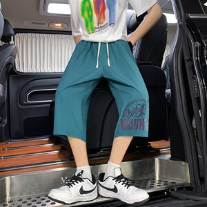 QK72255-P25冰丝七分裤男大码速干短裤男五分裤 港风图片