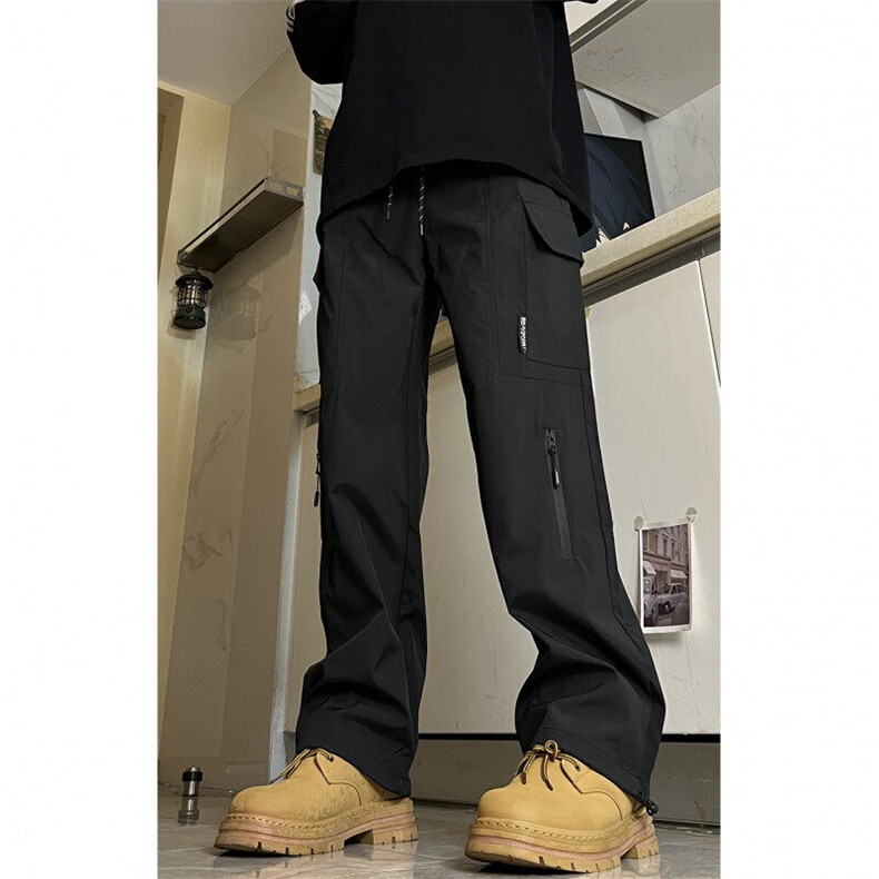 聚酯纤维2025年秋冬季防风防水冲锋裤大口袋直筒工装裤男女,男装工装外套,电商A086-1