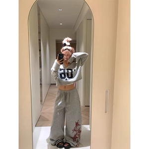 美式慵懒休闲 ??星星印花抽绳弯刀卫裤男女宽松百搭拖地长裤图片