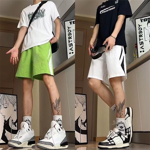 现货 YK86007-TP17聚酯纤维 发泡格子拼接短裤速干五分裤男女图片