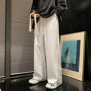 2025秋冬现货男装格子宽松休闲直筒运动裤新款潮流长裤DM157-P40图片