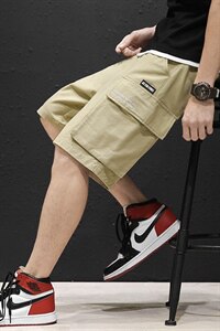 A003-HK7012-P45 夏装新款时尚口袋男士工装短裤 黑墙图片