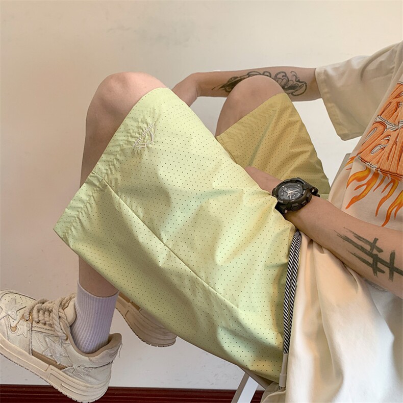 网眼冰丝短裤男夏季薄款宽松运动速干沙滩裤潮牌外穿休闲五分裤子图片