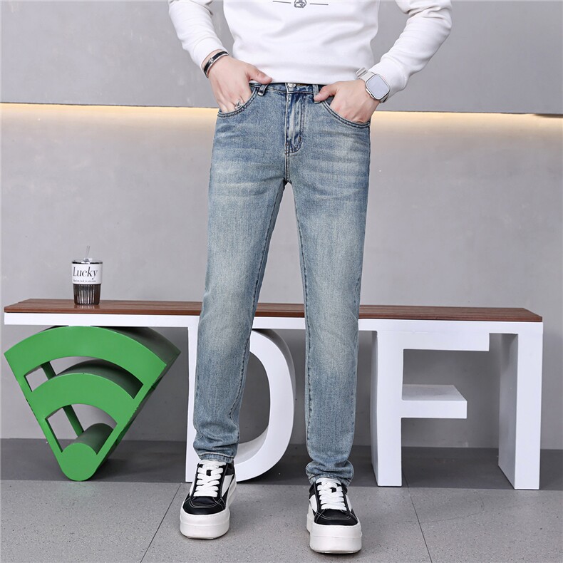 四季潮款简约设计水洗弹力牛仔裤男修身小脚休闲百搭长裤图片