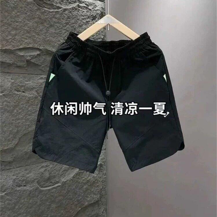 夏季眼透气速干休闲短裤男高档简约纯色宽松运动五分沙滩裤图片