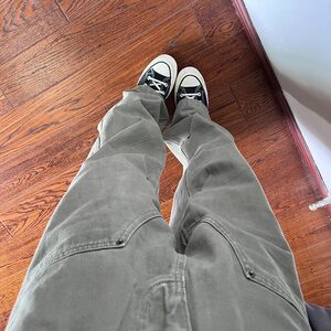 美式复古水洗做旧铆钉褶皱伐木工装裤hiphop炸街裤子男微喇牛仔裤图片