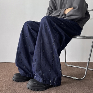春秋男士韩系设计款牛仔割洞提花重工水洗牛仔裤宽松裤子图片