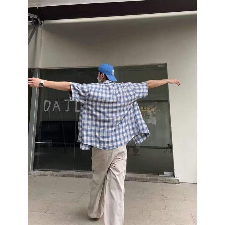 蓝色格子棉麻衬衫女夏季设计感木耳边甜美娃娃衫宽松泡泡短袖上衣图片