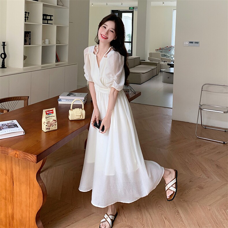 白色V领连衣裙女夏季新款法式高级感收腰显瘦气质女神范茶歇长裙图片