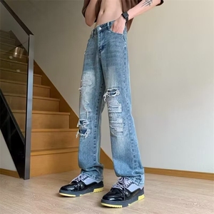 新款男牛仔裤男修身小脚裤弹力潮流破洞裤青年春秋长裤图片