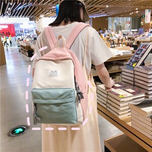 初高中书包2021时尚少女撞色帆布双肩包开学季女包图片