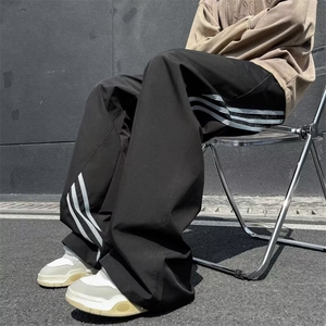 三条杠冲锋裤子男户外机能防水登山裤子痞帅宽松休闲长裤K135/P35图片