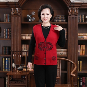 2024秋冬新款中老年女款V领纽扣花纹仿开衫背心马甲图片