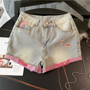 欧韩时尚潮流套装女夏新款V领撞色拼接短袖针织衫牛仔短裤两件套图片