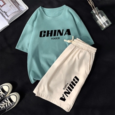 绿衣卡其裤